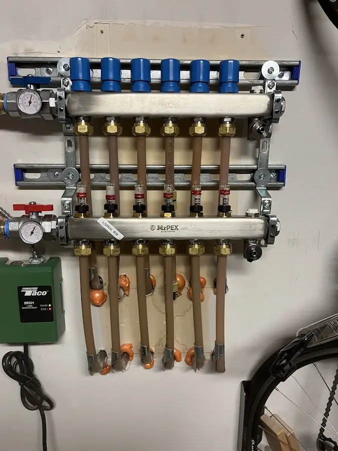 Plumber performing Leak Detection at a residential property in University Center